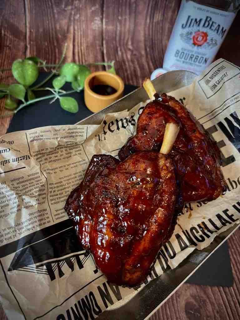 Honey bourbon pig wings